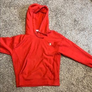 a red reverse weave champion hoodie
